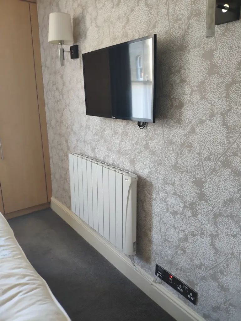 iSense Wi-Fi Electric Radiator with heating management installed in an Hotel
